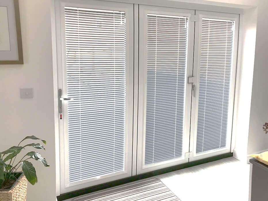 White bi-fold door blinds