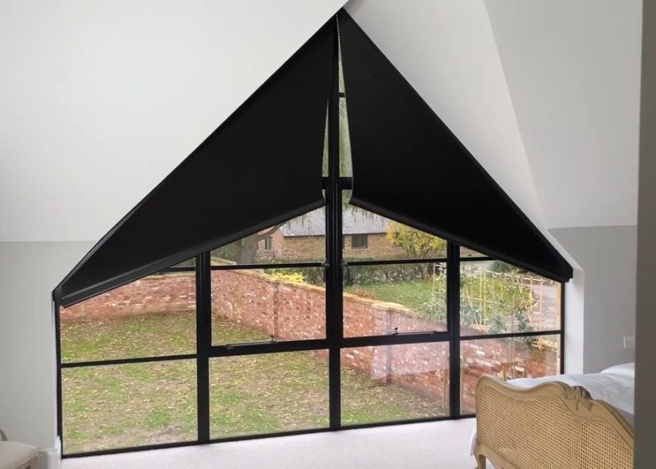 Motorised apex blinds in a triangular window